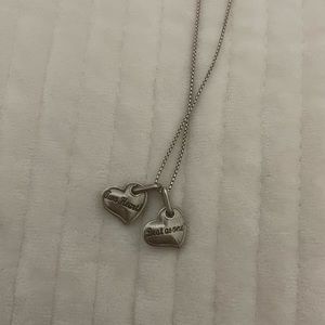 Necklace two hearts beat as one.